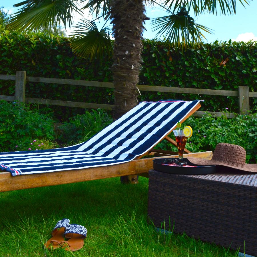 blue and white striped beach towel