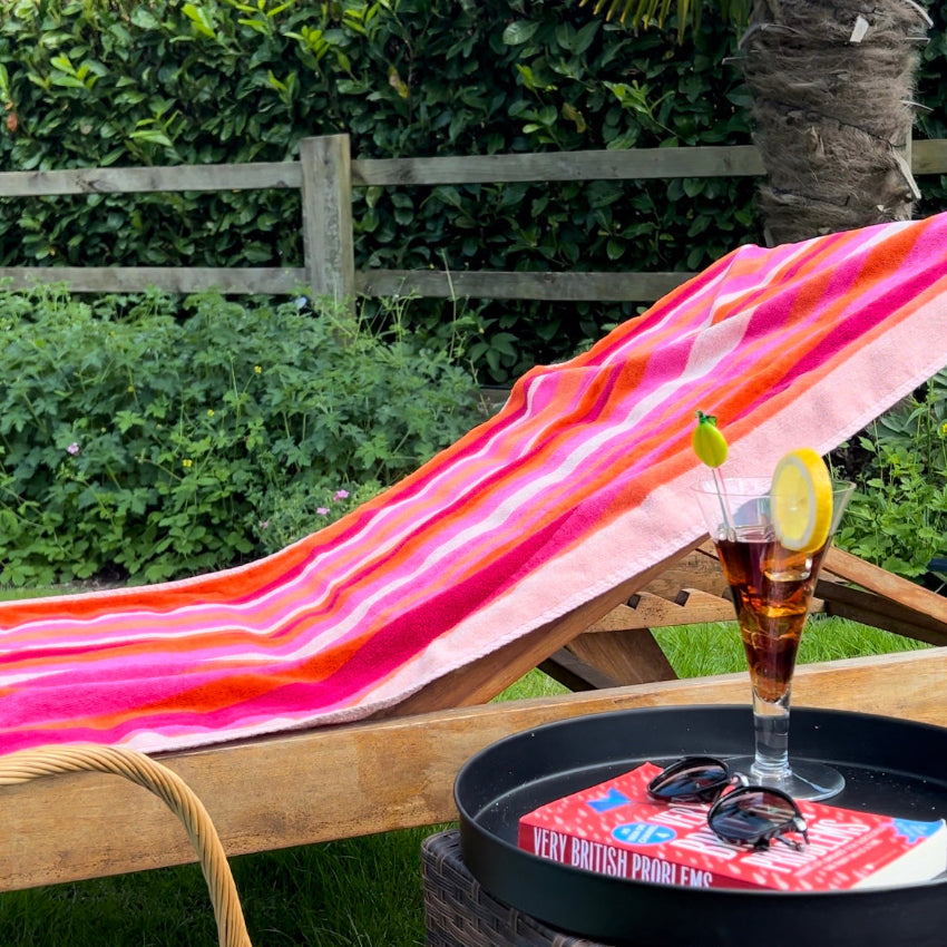 Ladies pink striped beach towel