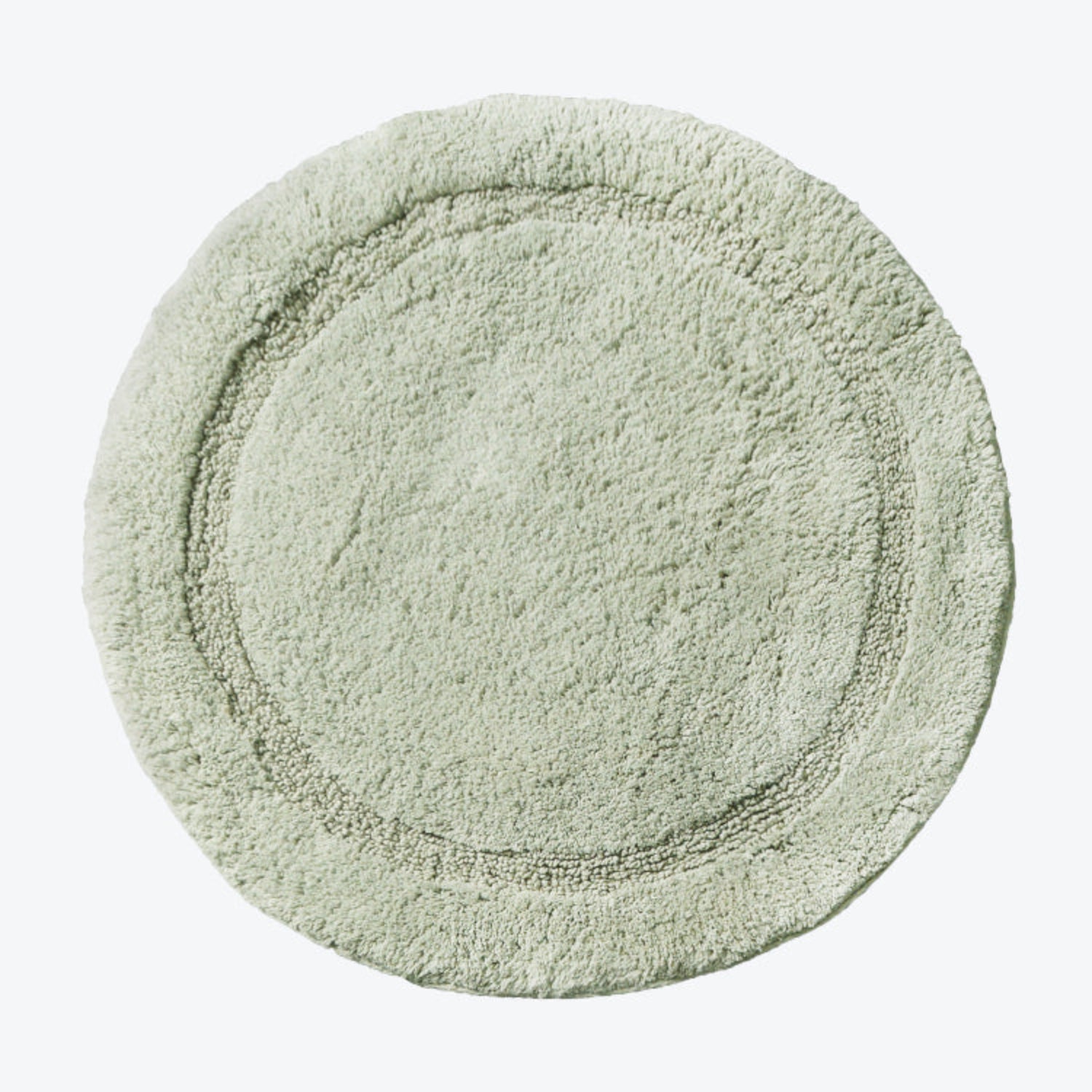 Sage green round cotton bath mat, non slip backing.