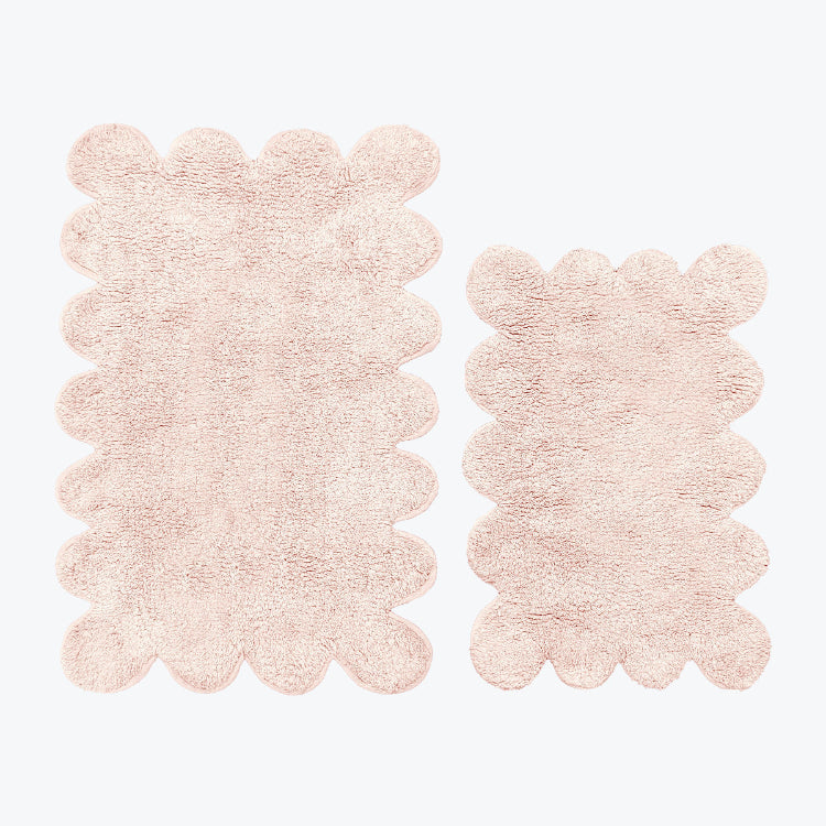 Blush pink scalloped bathroom mat set, two piece.