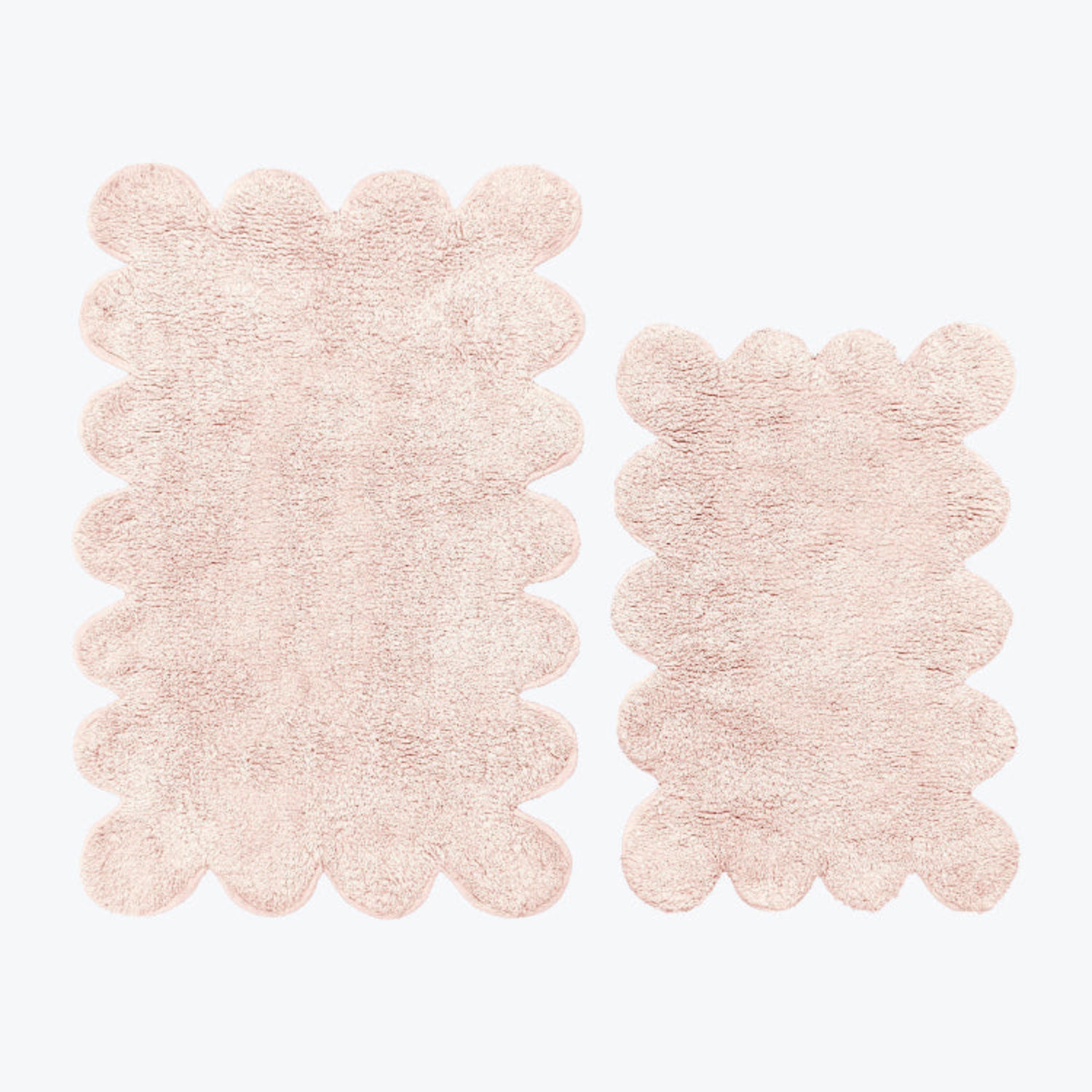 Blush pink scalloped bathroom mat set, two piece.