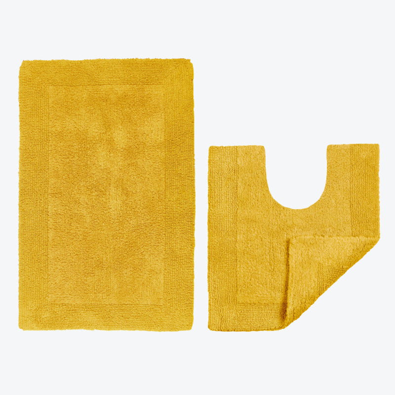 Mustard yellow bathroom mat set, 2pc bath mat and toilet mat made from 100% cotton.