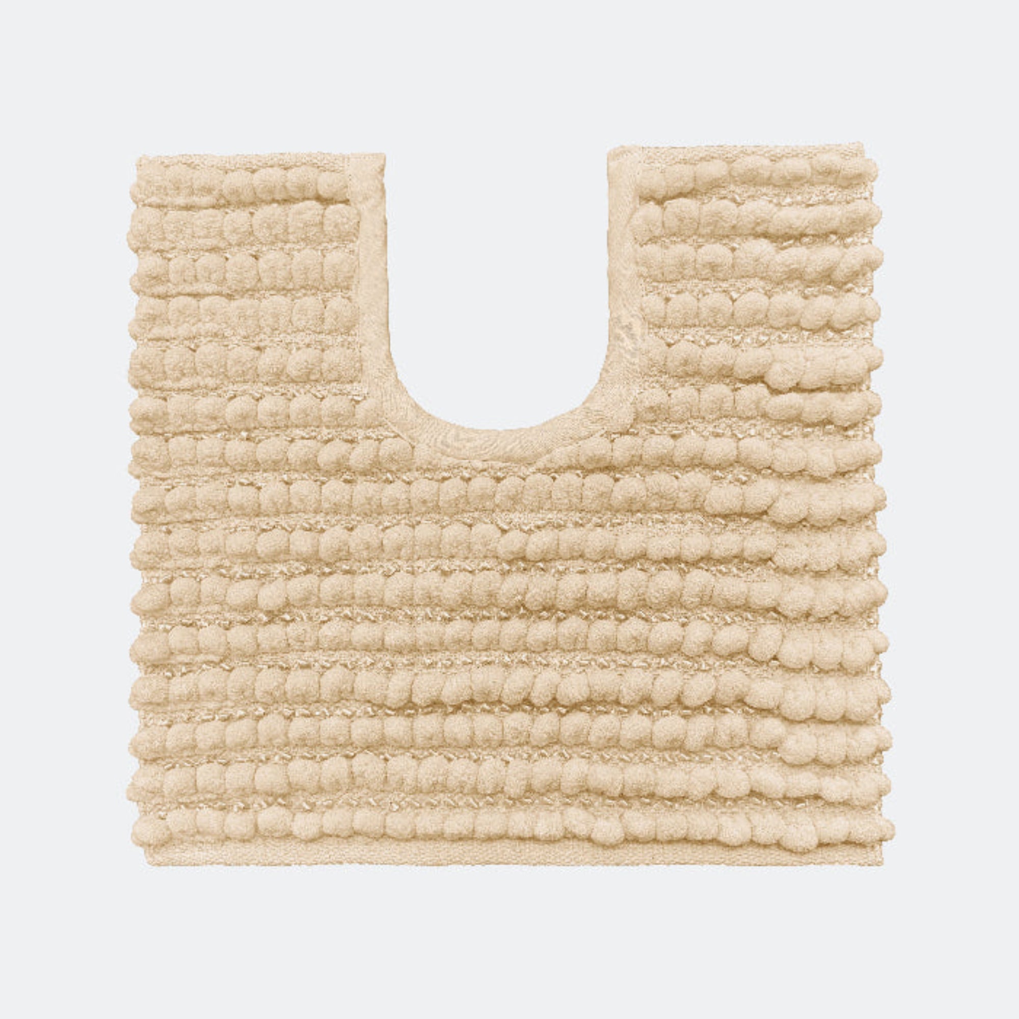 Beige pedestal toilet mat made from chenille - chunky bobble design.