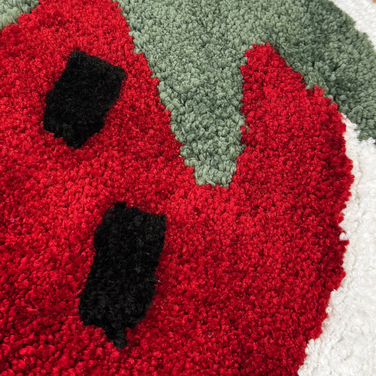 Hand tufted fun bath mat, with novelty red strawberry design. Cute strawberry decor.