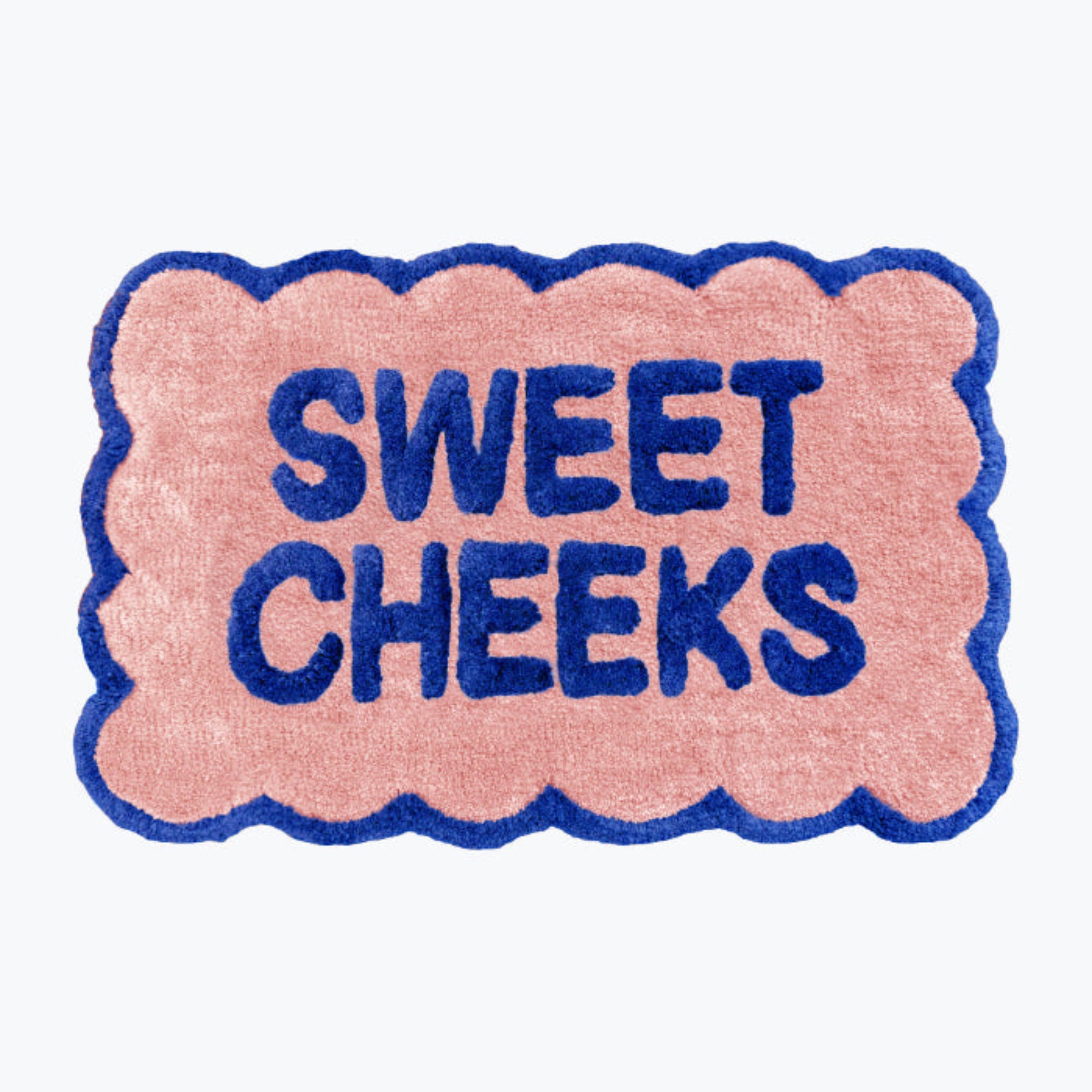 Statement bath mat, scalloped shape. Fun slogan mats for the bathroom.