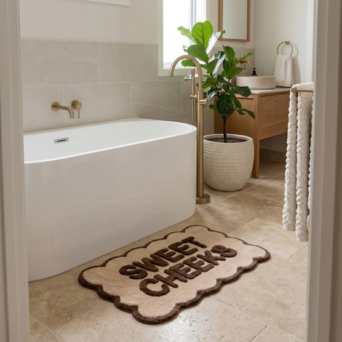 Brown bath mat with slogan design - sweer cheeks scalloped bathroom rugs.