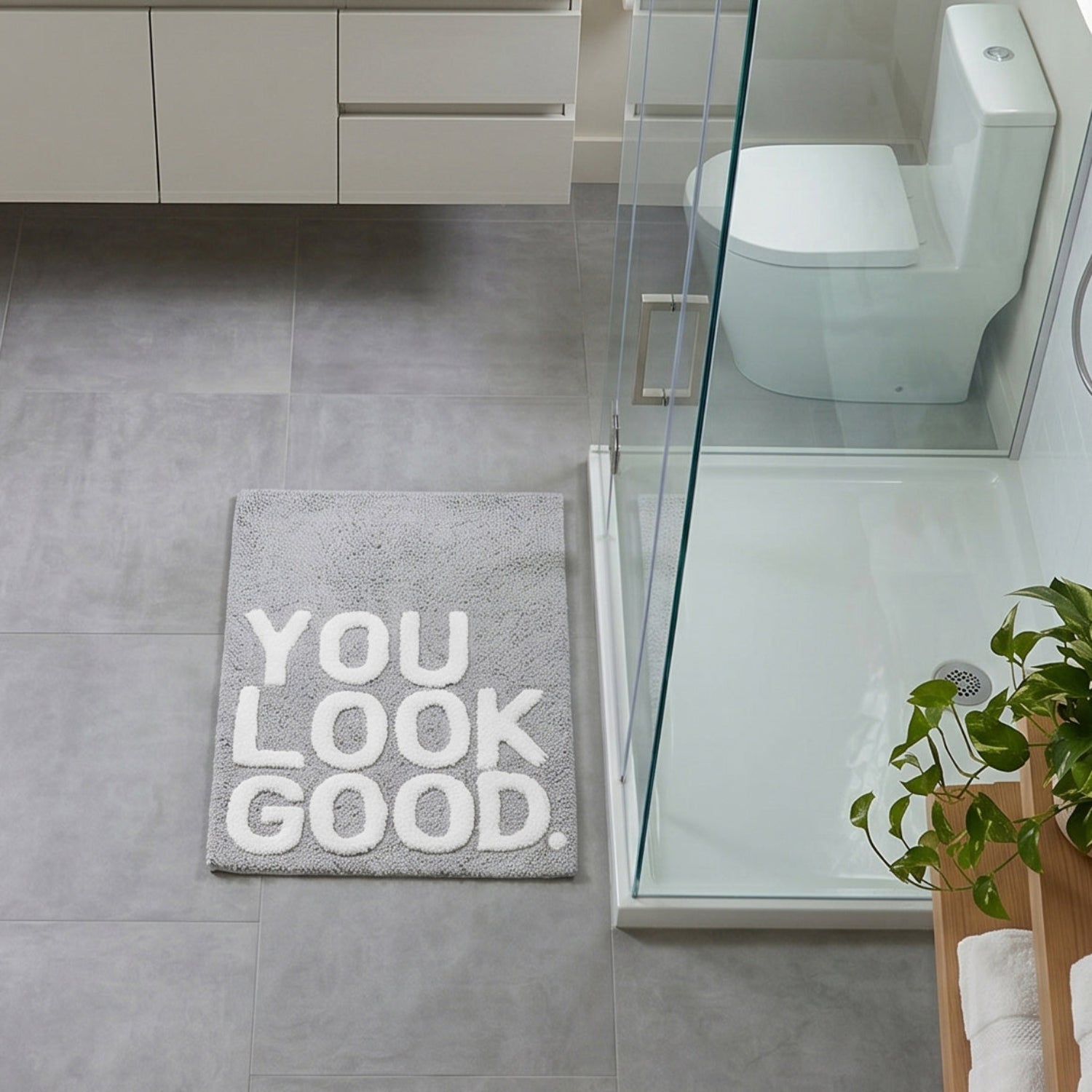 You look good slogan bath mat in grey and white - non slip backing.