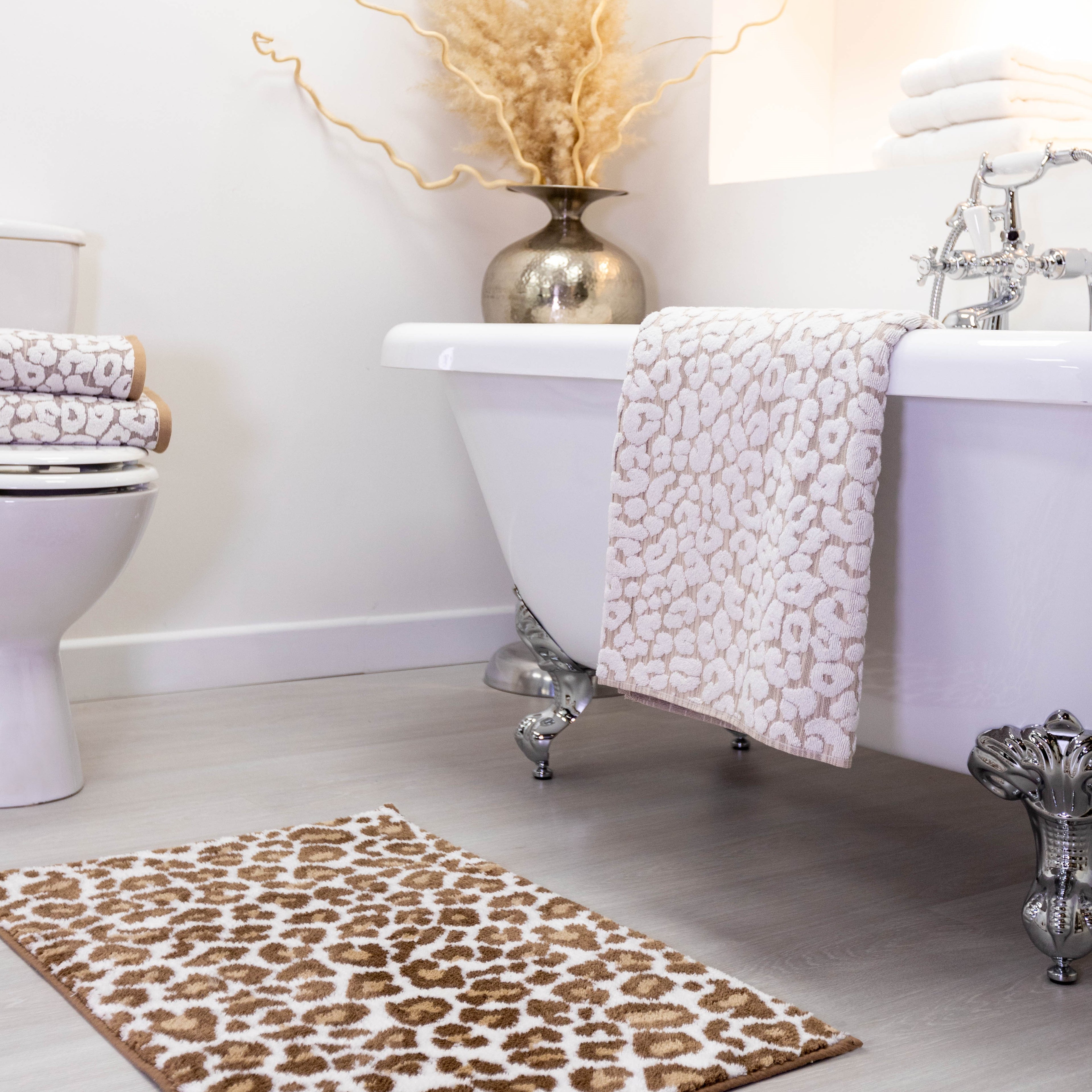 Neutral Bathroom decor - Leopard print co-ordinated towel and bath mats
