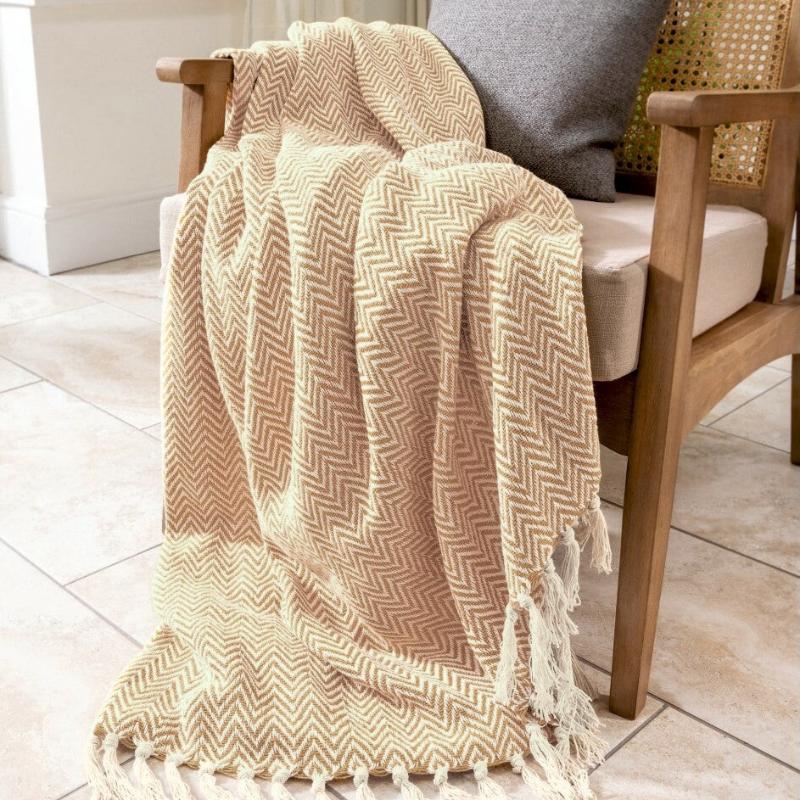 Audley herringbone chevron throw in beige.