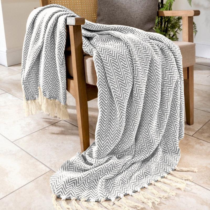 Audley herringbone chevron throw in light grey.