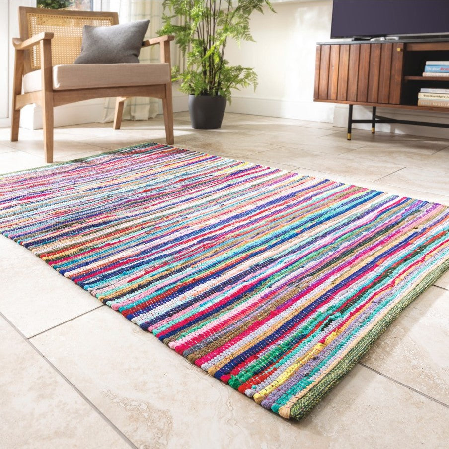 Chindi rag rug styled in a living room. Colourful boho rug.