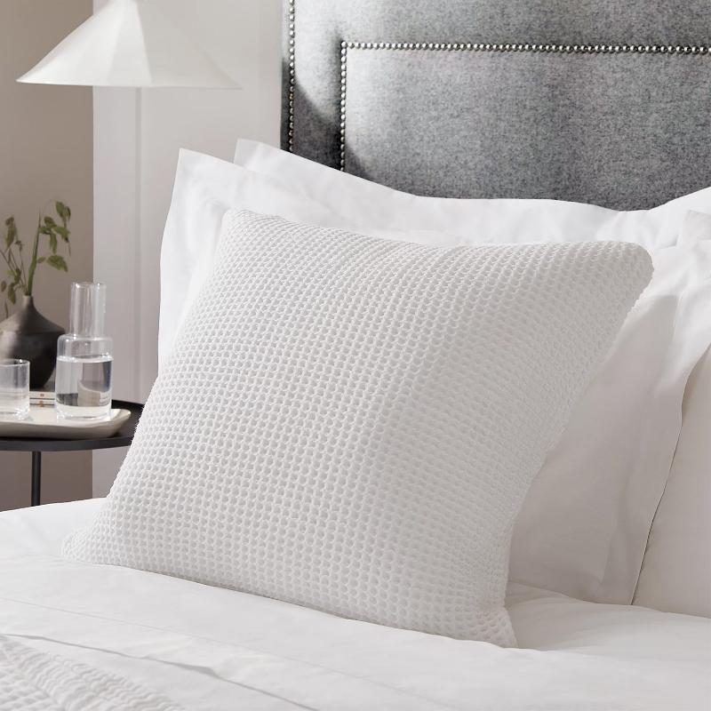 White Waffle Textured Cushion Covers to match the large bedspread in white.