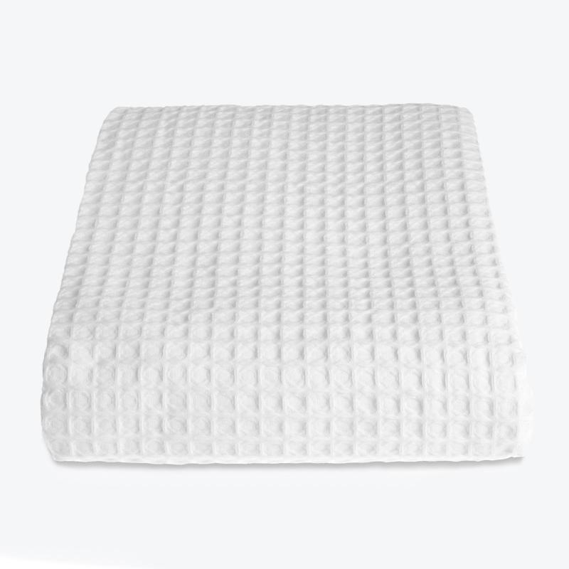 Premium Waffle Throw in white. Cotton bedspread in a luxury textured fabric for style and comfort.