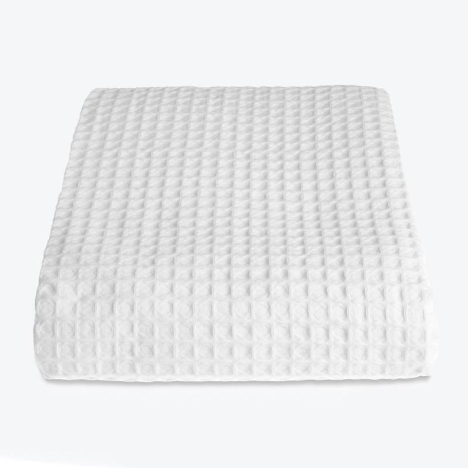 Premium Waffle Throw in white. Cotton bedspread in a luxury textured fabric for style and comfort.