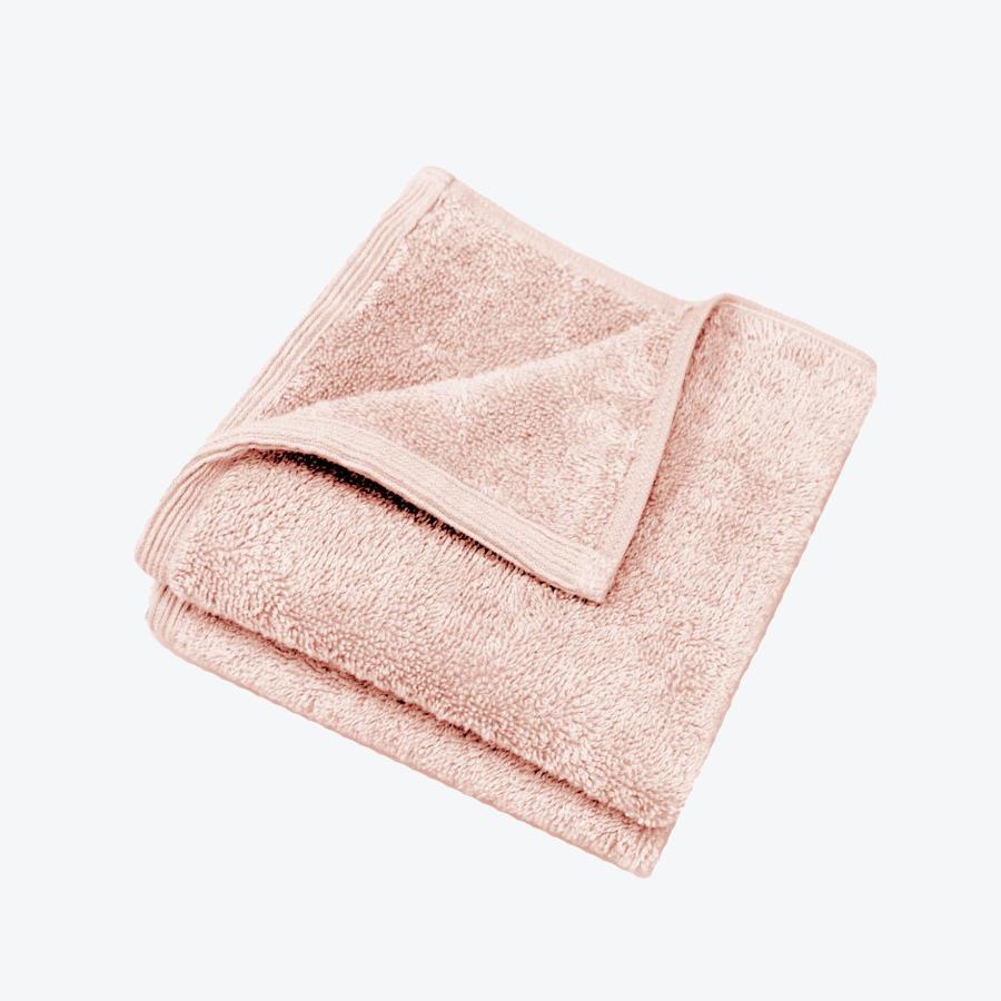 Blush pink bamboo face cloths.