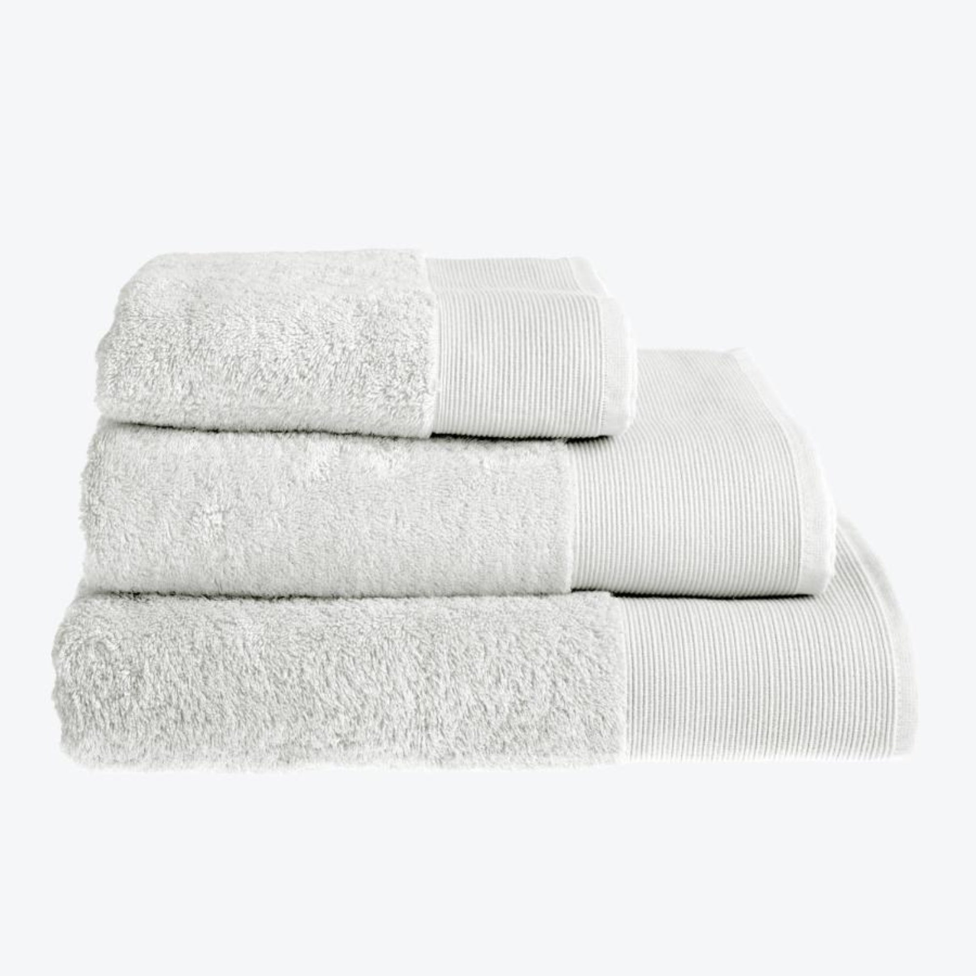White bamboo towels set, face cloths, hand towels, bath towels and bamboo bath sheets.
