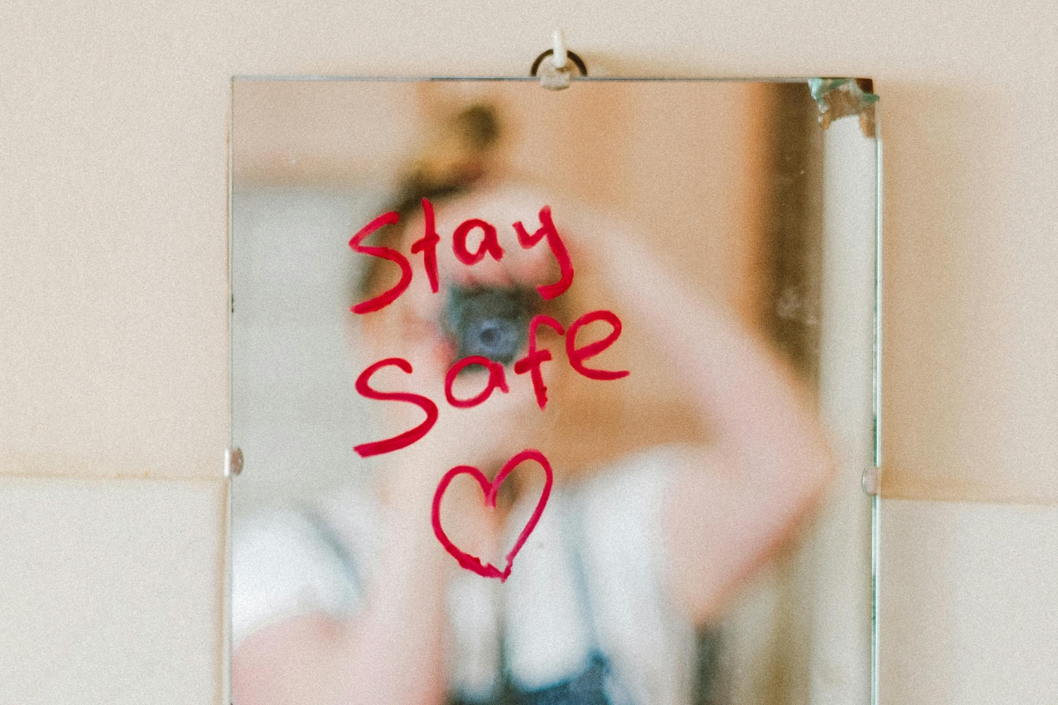 Stay Safe Text on Mirror in Bathroom