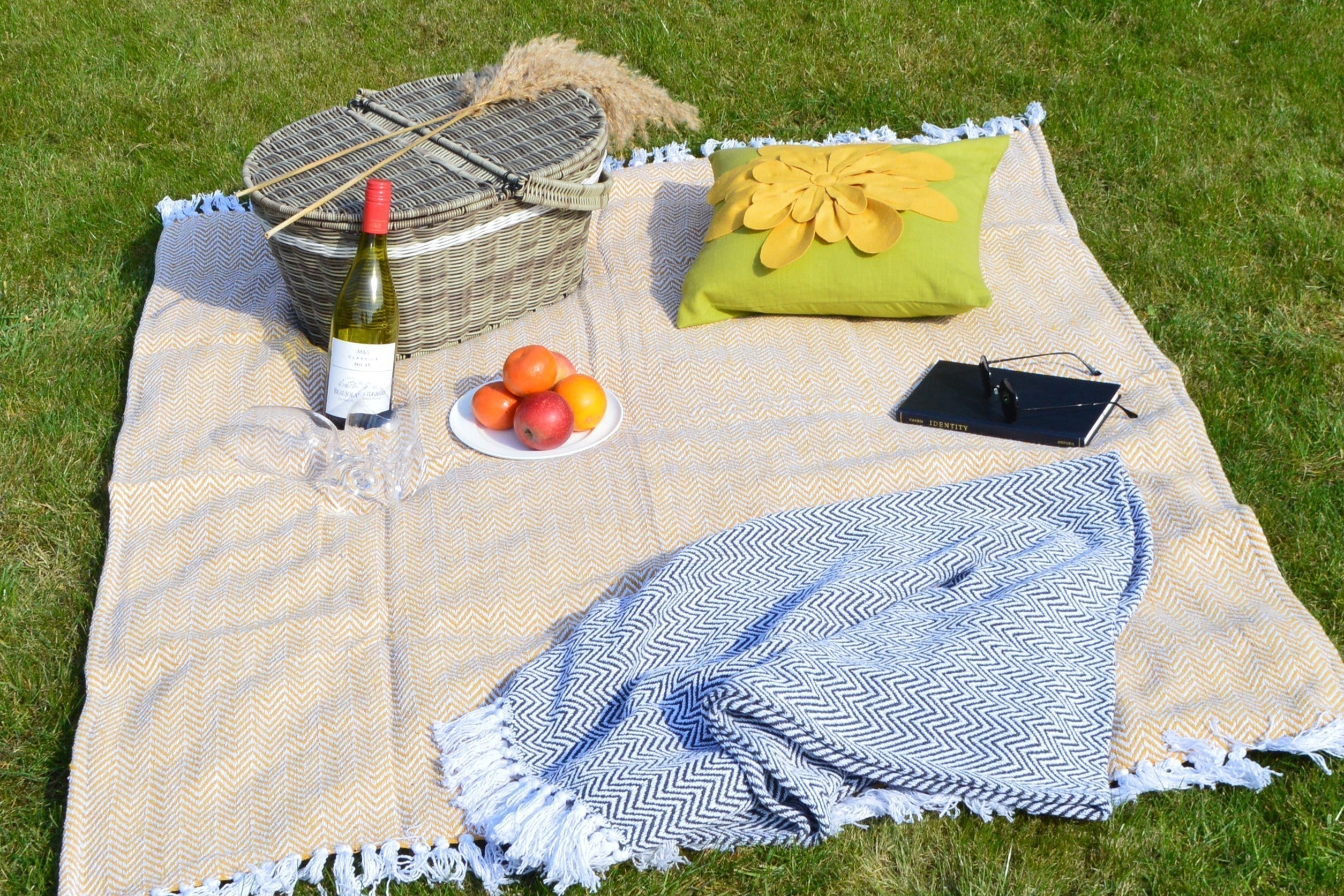 herringbone throw being used as a picnic blanket