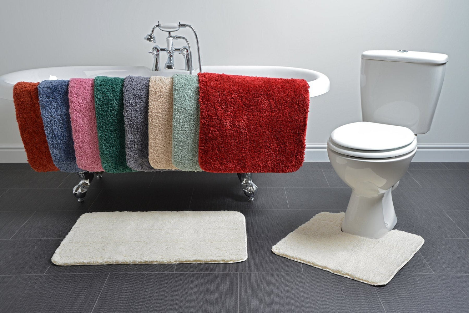 microfibre bath mats and pedestal mats on the side of a bath