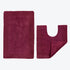 Beetroot burgundy set of bathroom mats, made from cotton.