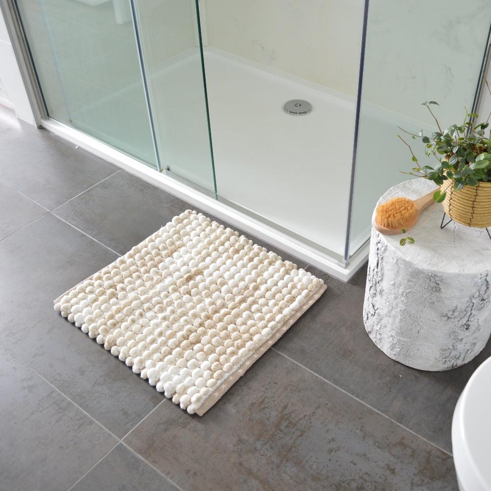 beige chunky bobble square bath mat. Luxury thick small bath mat for the shower.