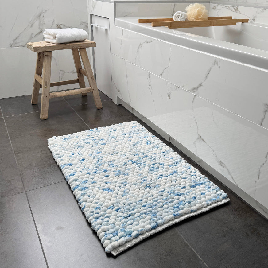 Blue marble bathroom rugs with non slip backing.