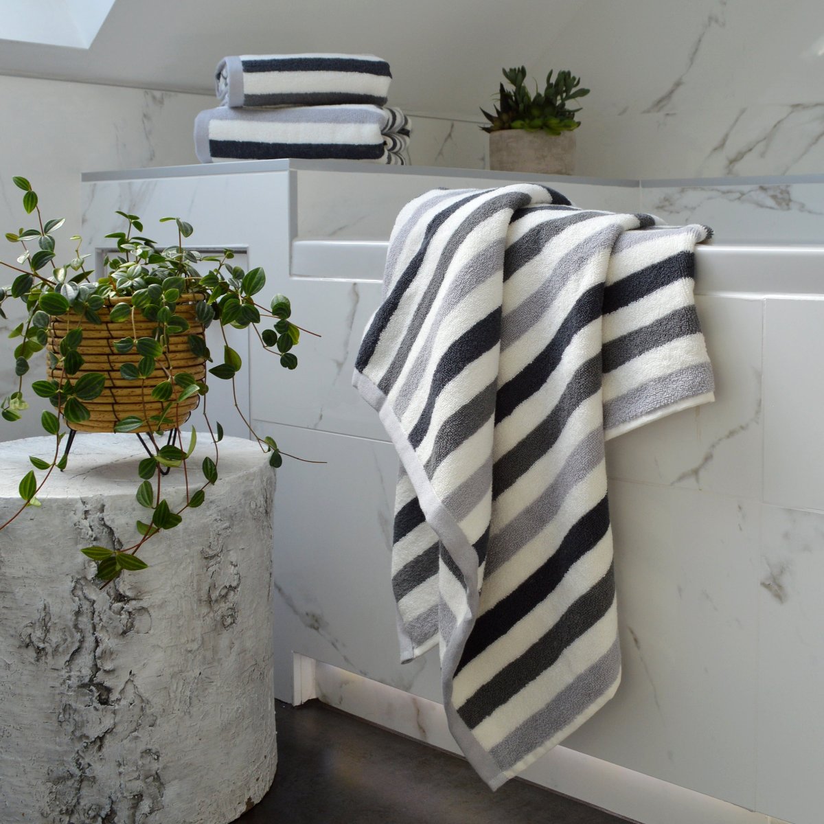 Grey striped towels for the bathroom