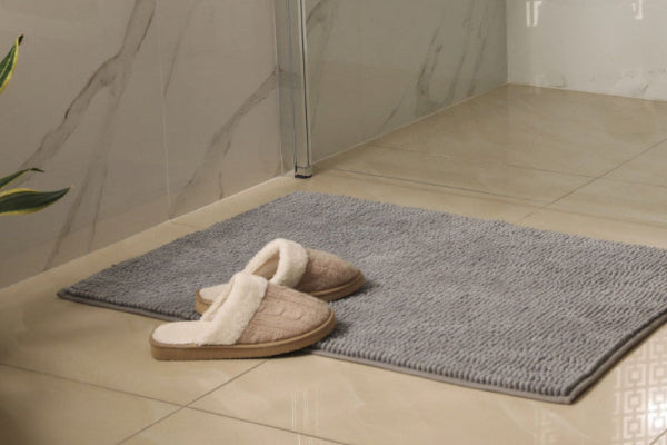 Grey non slip bath mat, soft chenille bobbles.