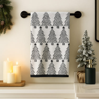 Black and white Christmas Hand towels with monochrome trees pattern.