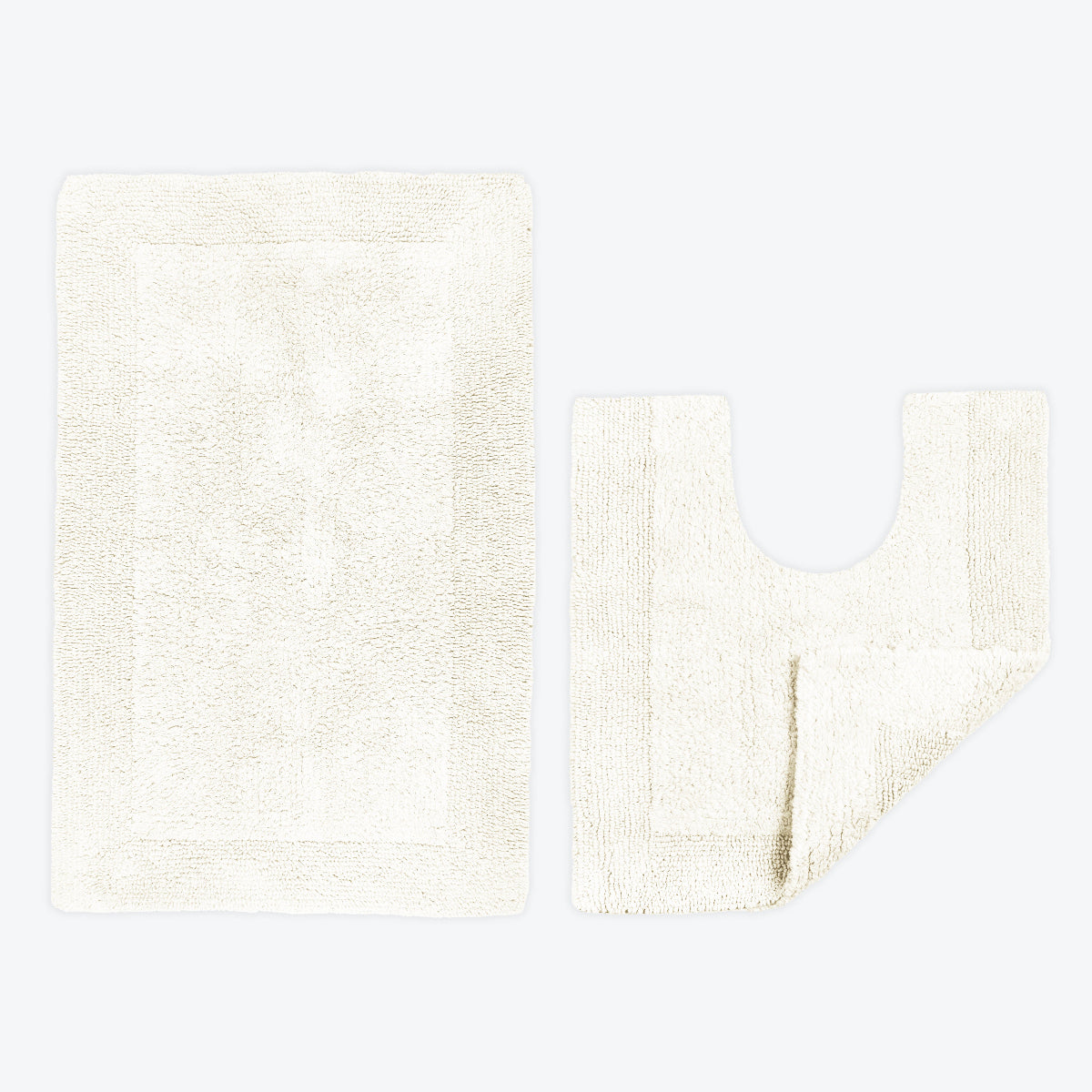 Cream bath ma and pedestal mat set.