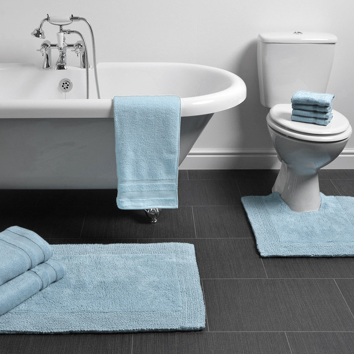 Baby blue reversible cotton bath mats and towels