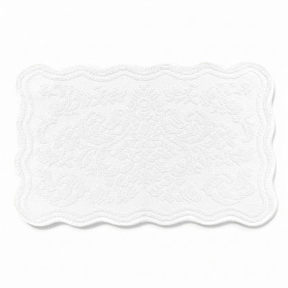 Scalloped bath mat in white colour, with floral texture design - made from 100% cotton.