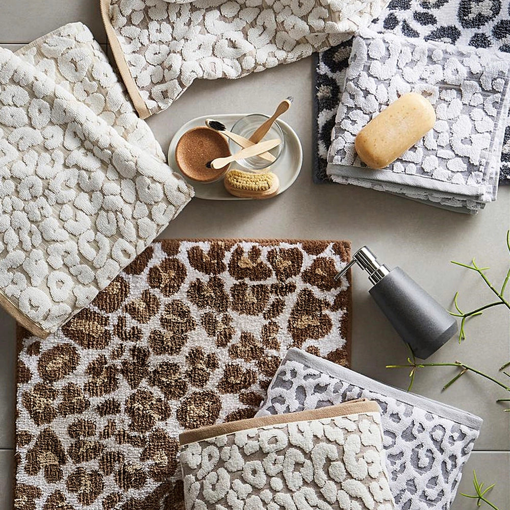 Leopard print bathroom towels and mats