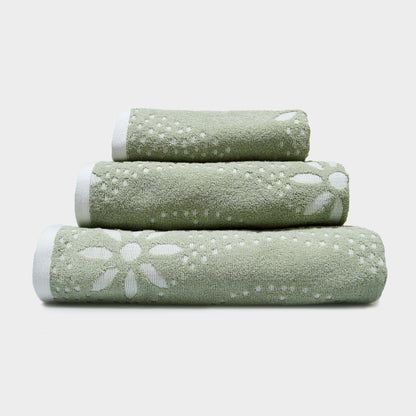 A stack of Marrakesh Towels in Sage Green