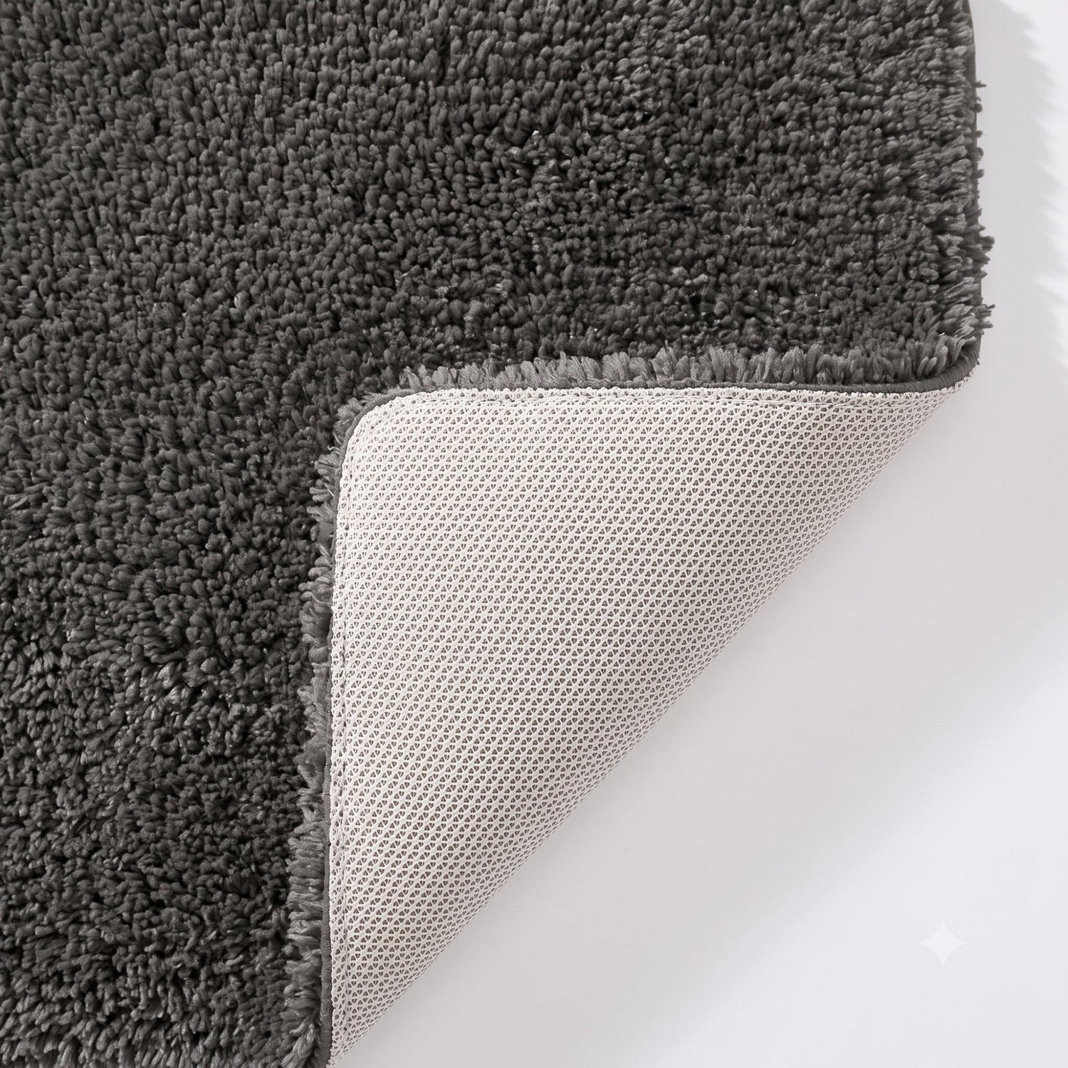 Non slip microfibre bath mat in dark grey colour.