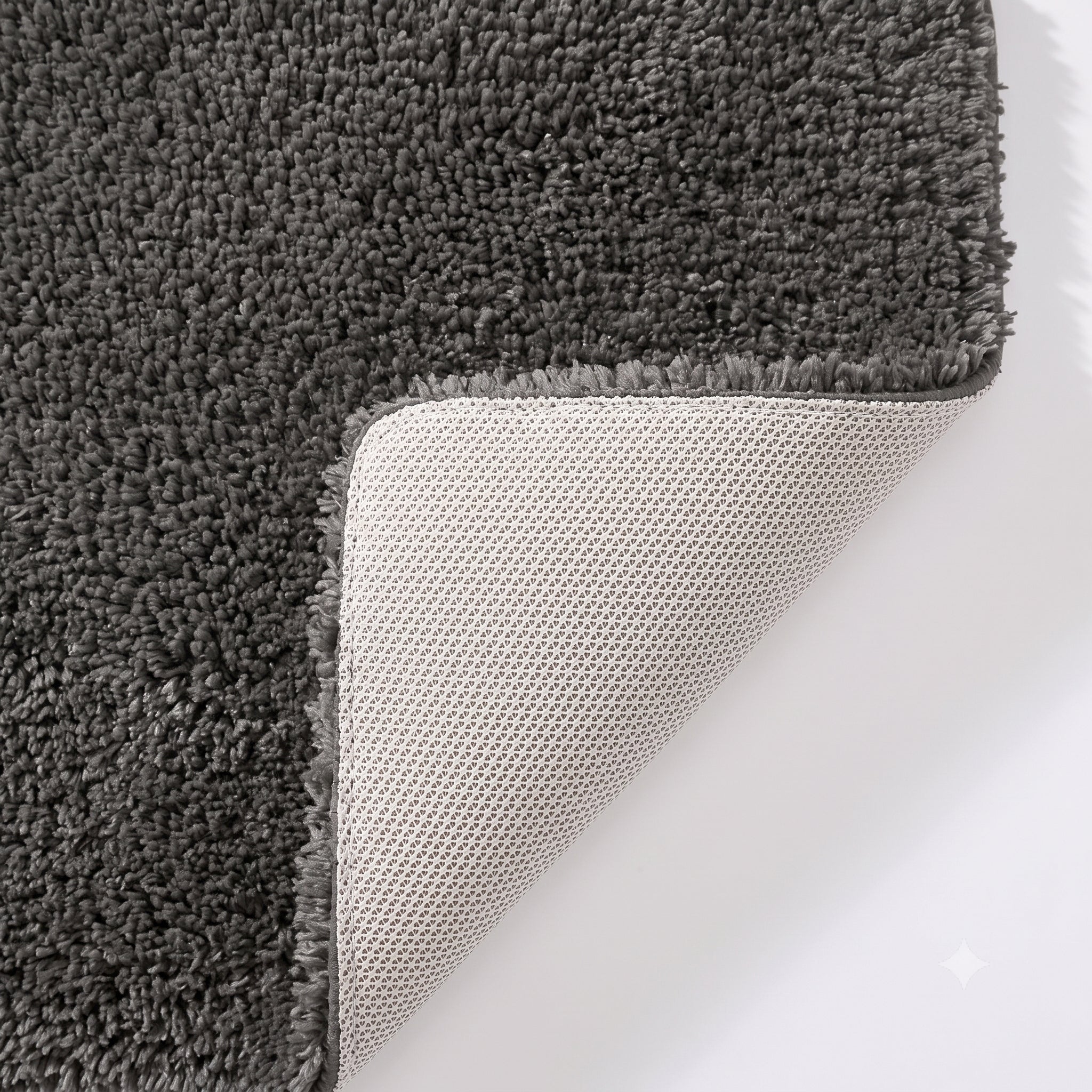 Grey non slip bath mat with rubber backing.