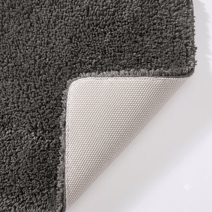 Grey non slip bath mat with rubber backing.