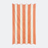 Orange striped beach towel with scalloped edge, made from cotton.