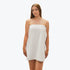 White velcro towel wrap made from cotton. Adjustable secure fit for getting ready or for the beach.