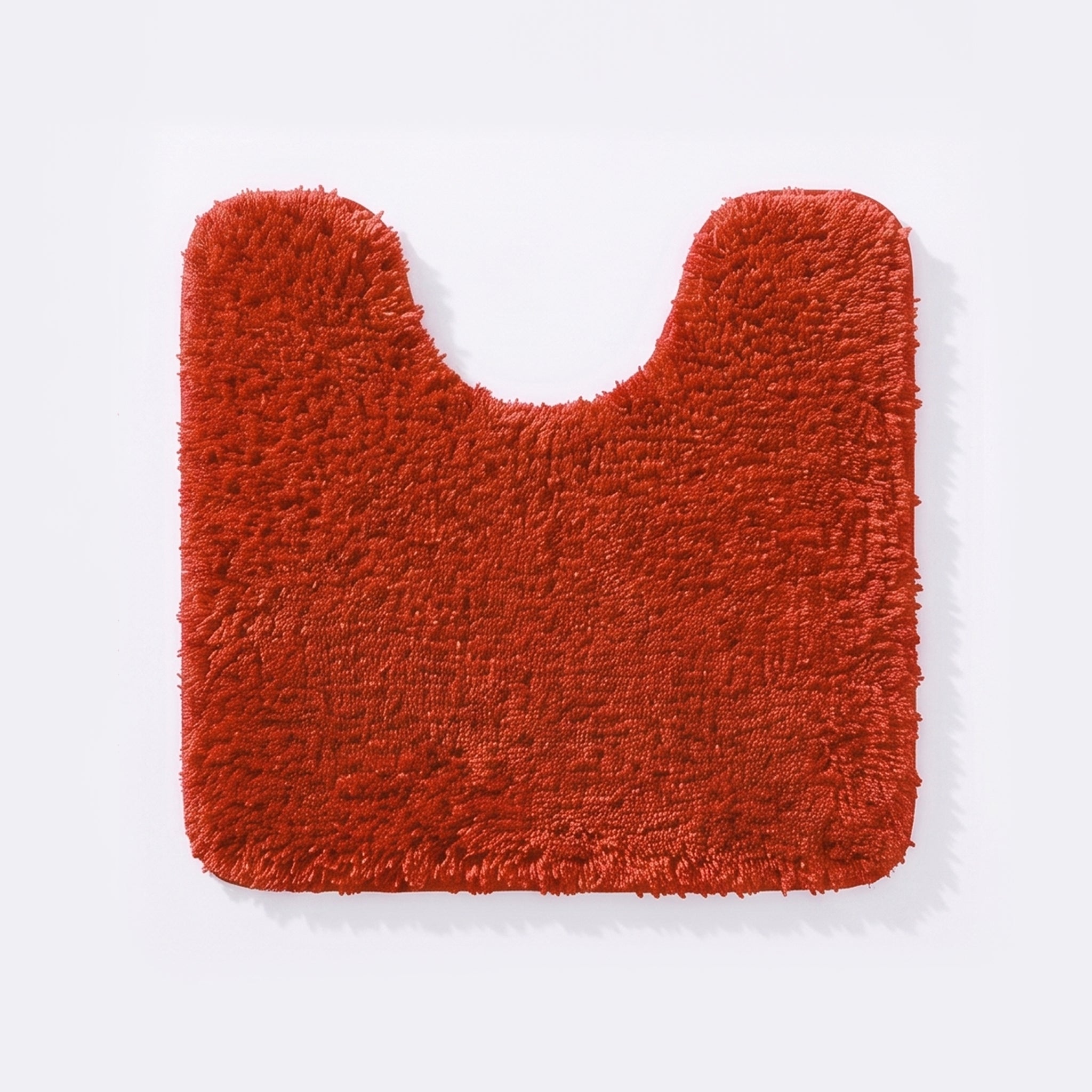 Burnt orange non slip pedestal mat for the toilet or sink basin, plush shaggy microfibre pile.