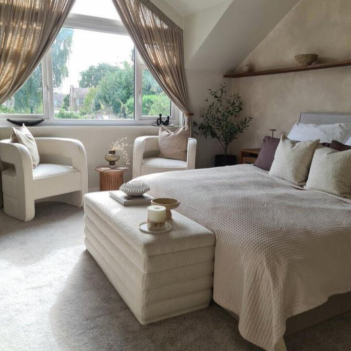 Taupe bedspread for a king size bed in a waffle texture.