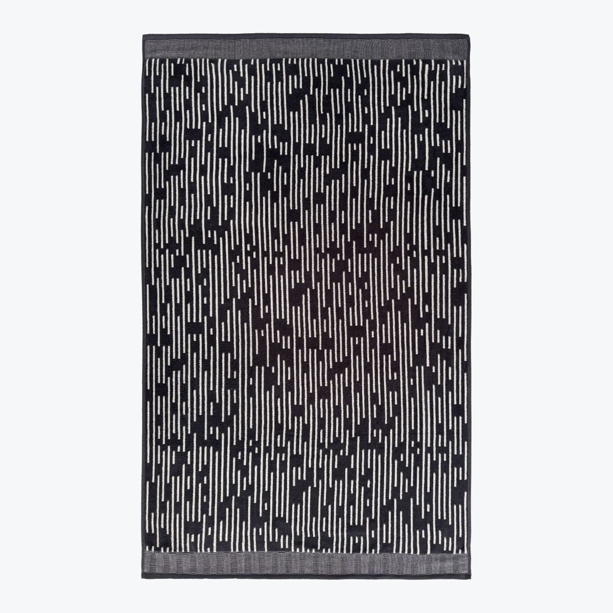 Patterned stripe towel, full spread in black.