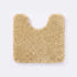 Beige non slip pedestal mat for the toilet or sink basin, plush shaggy microfibre pile.