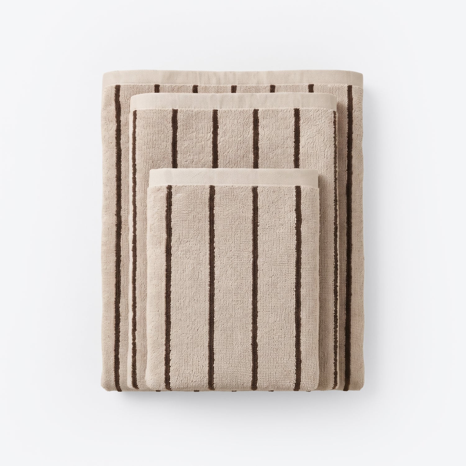 Striped bathroom towels in beige and brown colours - timeless pin stripe pattern.
