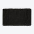 Black thick bath mat with luxury bobble texture. Super soft and absorbent washable rug.