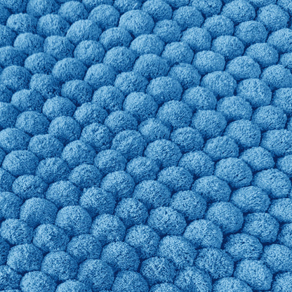 Blue giant bobble bath mat with thick pile.