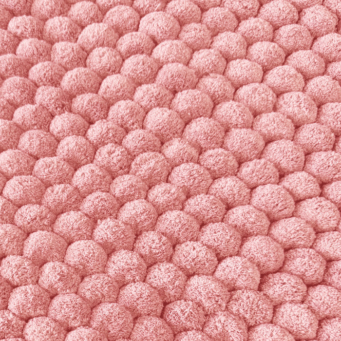 Pink giant bobble bathroom mats, super thick and soft.