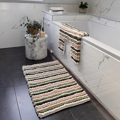 Green bathmat and pedestal mat set, chunky bobble design.