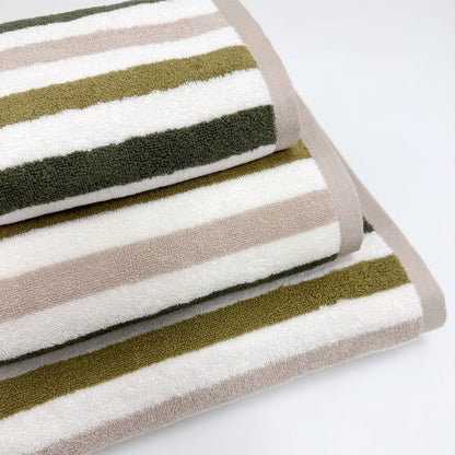 Soft and stylish green striped patterned towels.