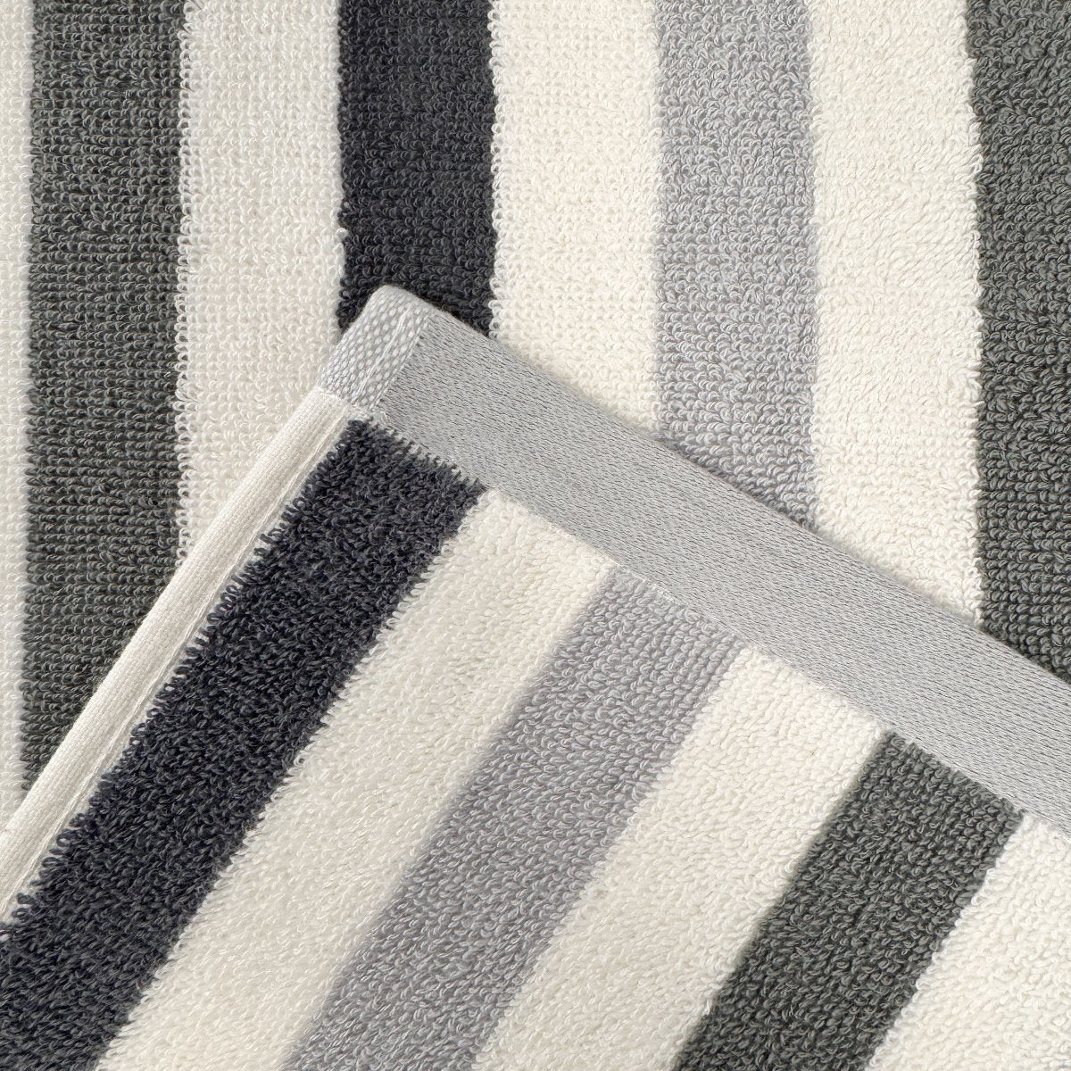 Thick striped towels for the bathroom. Grey and white stripes.